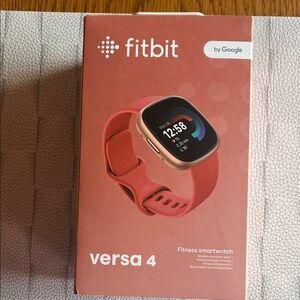 New fitbit Versa 4 Smartwatch - Coral Band with Rose Gold Case never opened